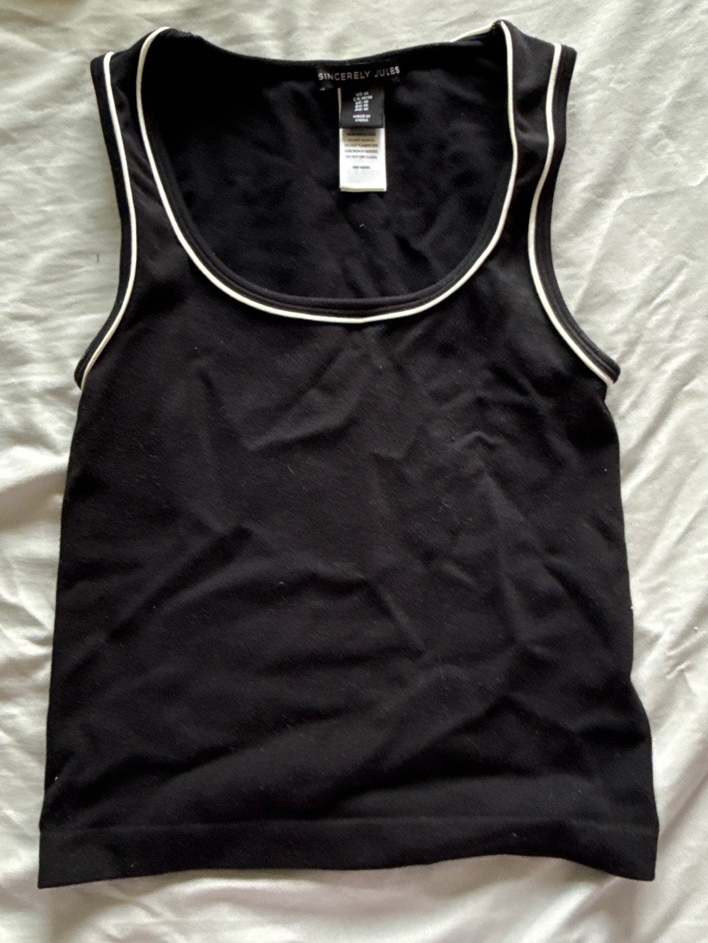 Sincerely Jules Black Top with White Care Tag Detail